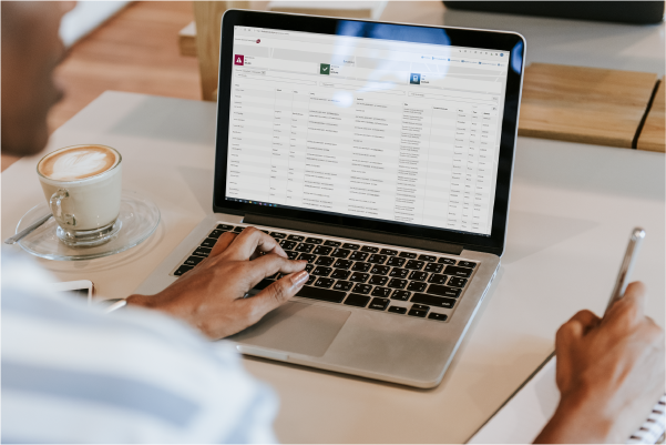 Person visiting VEC Disclosures portal on laptop Person visiting VEC Disclosures portal on laptop